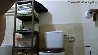No-Name-Girl taking a huge poop