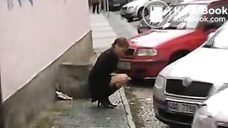 girl pooping in the pants in the street