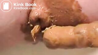 dildoed_ass_shitting