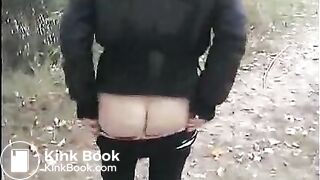 Amateur chick shitting on the road in the park - Scat Video Collection