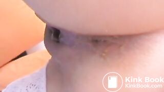 Girl fingers her wonderful ass and shits