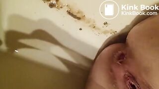 Enema expulsion, pissing and fingering in bath