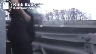 Woman Taking Dump Next To Busy Highway