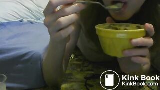 girl enjoys eating  scat custard and pudding