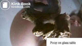 poop on glass table