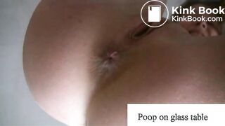 poop on glass table