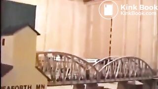 Woman Shits on a Model Train