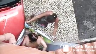 Woman shitting in the street