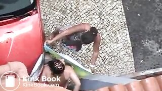 Woman shitting in the street