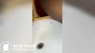 Me taking a dump into our sink