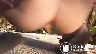 Hot blonde taking a shit outside in public