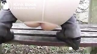 Girl shit and pissing on a bench by the stone wall _ Girls pooping indoor