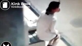 Woman Shitting At Bus Stop