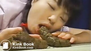 asian woman sucks on a shit