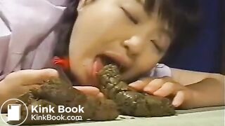 asian woman sucks on a shit