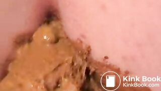 Lucy fucks herself on toilet