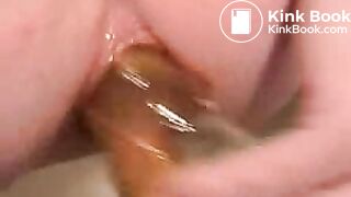 Lucy fucks herself on toilet