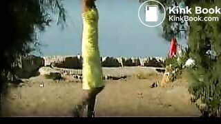 Green dress at beach