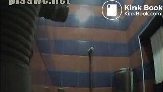 Lady has a stomach sick in a public toilet