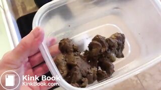 Vanessa shitting into a plastic container