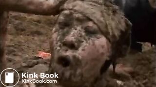 2 girls wrestling on manure field
