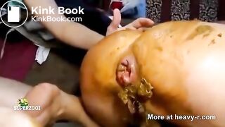 Stuffing Shit In Both Fuckholes