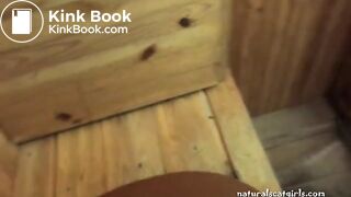 Woman scat in toilet with a beautiful view from the window