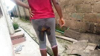 Hot ebony shitting in her pants outside