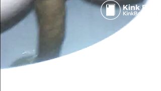 Woman shitting a long turd very slowly in the toilet