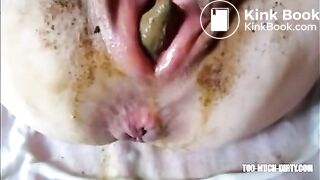 Dirty lady eject a piece of shit from her cunt