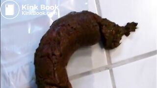 Woman shitting a long hard turd