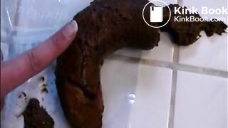 Woman shitting a long hard turd