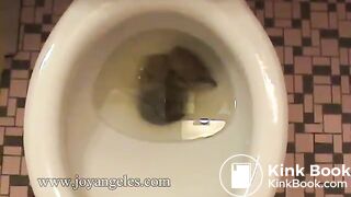 Mila Perlman  poops by side of bath