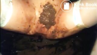 Hot babe is doing a big diarrhea and masturbating with shit