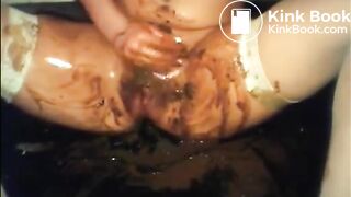 Hot babe is doing a big diarrhea and masturbating with shit