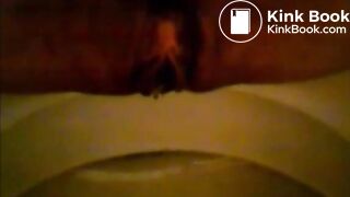Girl shitting in the toilet and inserting dildo on her asshole