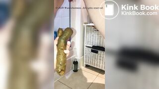 Pushing a long hard turd into boyfriend's hand