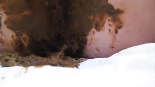 Mature lady masturbating with brush and shitting