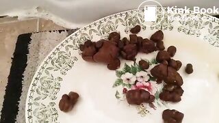 Pooping hard lumps on a serving plate