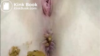 Girl shitting and fingering her asshole
