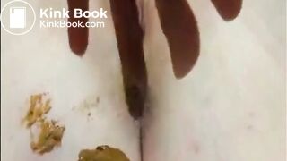Girl shitting and fingering her asshole