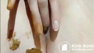 Girl shitting and fingering her asshole