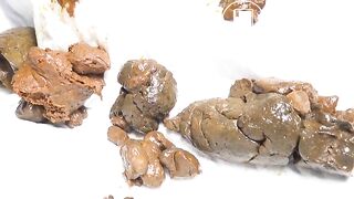 Sexy Asian girl poops hard lumps