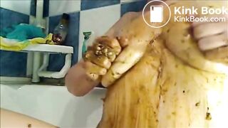 Woman is smearing shit on her breast