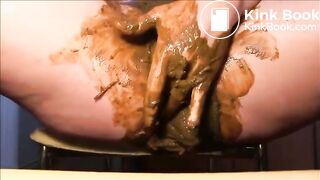 Woman fisting herself with a lot of shit