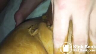 Smearing shit on her shaved pussy