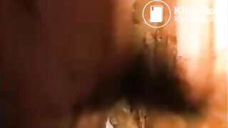 Woman smearing shit on her body