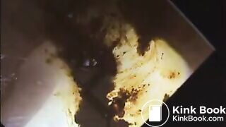Woman shit and piss on a mirror table