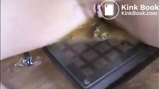 Woman shit and piss on a mirror table