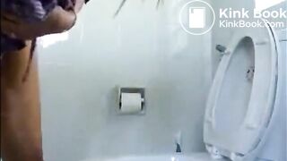 Amateur girl shitting in the toilet